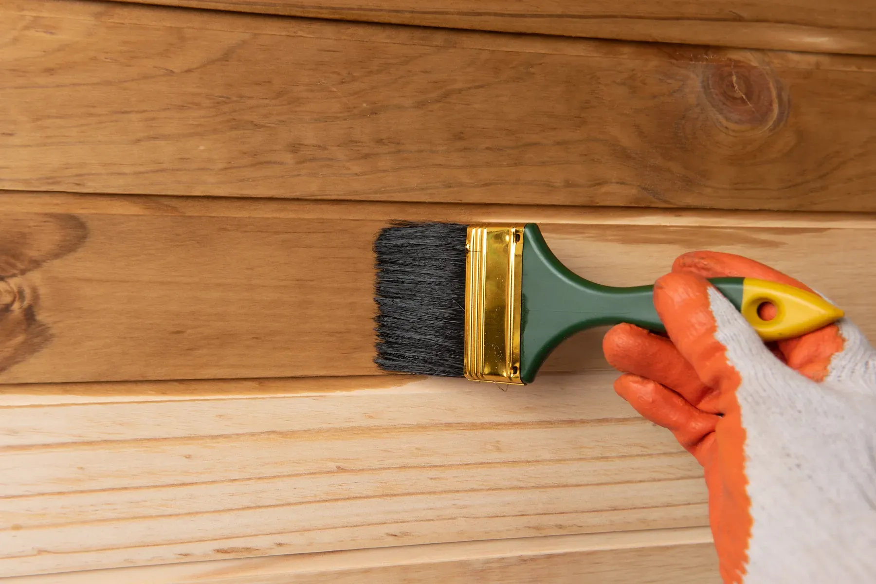 How to Treat and Paint a New Log Cabin (So It Lasts for Decades)